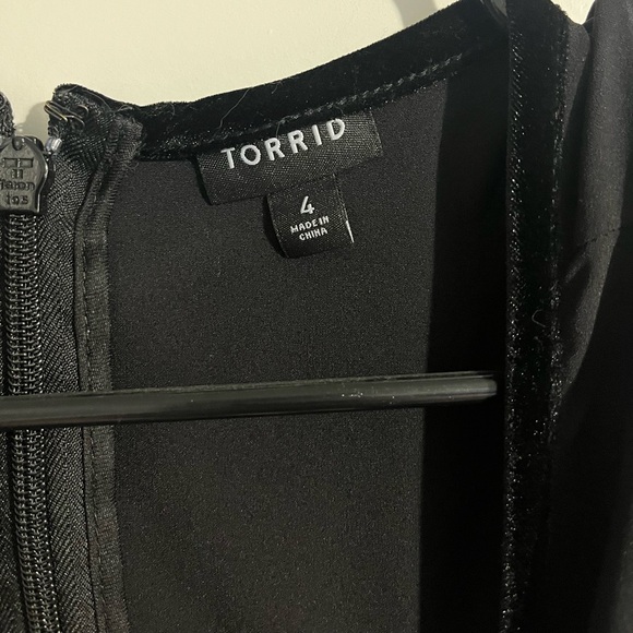 Black Crepe & Velvet Trim Asymmetrical Peplum Top - Picture 6 of 6